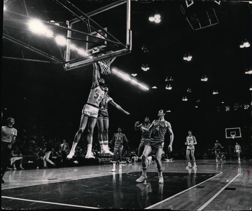 Kareem Abdul-Jabbar of the Milwaukee Bucks sank a layup and was fouled in the process in 1973.