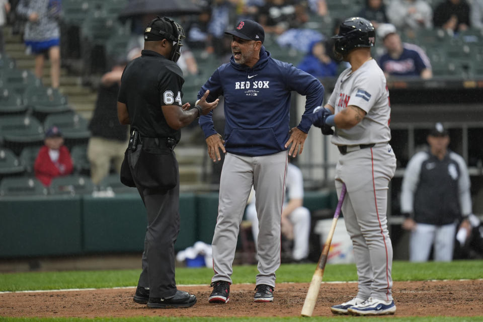 Boston Red Sox manager Alex Cora argues a strikeout call with umpire Alan Porter before being ejected during the fifth inning of a baseball game against the Chicago White Sox, Saturday, June 8, 2024, in Chicago. (AP Photo/Erin Hooley)