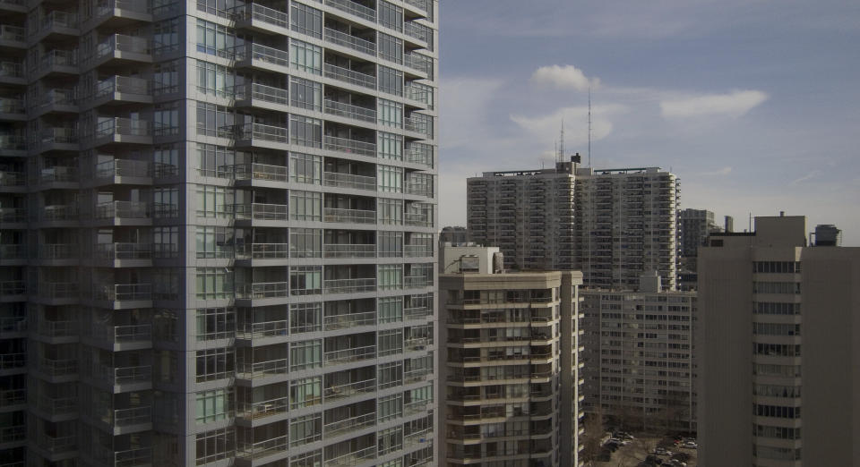 Rows of residential towers in a dense urban cityscape.