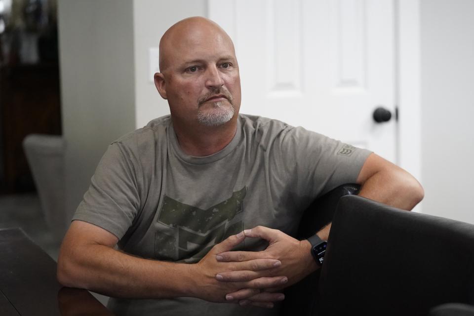 Darrell Fordham, of the Argyle Wilderness Preservation Alliance, discusses his worries about the proposed Uinta Basin Railway at his home Tuesday, July 18, 2023, in Lehi, Utah. The proposed railway would traverse a narrow, wooded canyon in the wilderness near where the family owns a cabin. (AP Photo/Rick Bowmer)