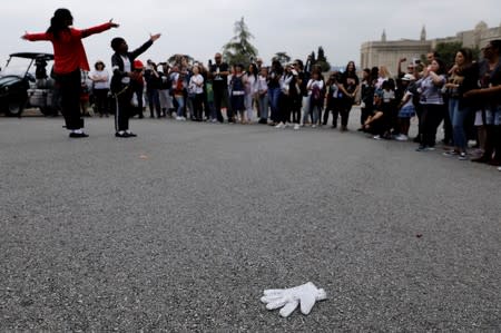 Fans gather at Forest Lawn Cemetery ten years after the death of child star turned King of Pop, Michael Jackson, in Glendale, California