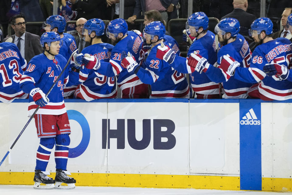 New York Rangers left wing Artemi Panarin is congratulated for a goal against the Philadelphia Flyers during the first period of an NHL hockey game Thursday, April 11, 2024, at Madison Square Garden in New York. (AP Photo/Mary Altaffer)