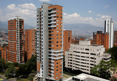 The Monaco building (R) and former home of the late drug lord Pablo Escobar is seen before being demolished, in Medellin, Colombia February 22, 2019. REUTERS/David Estrada Larraneta