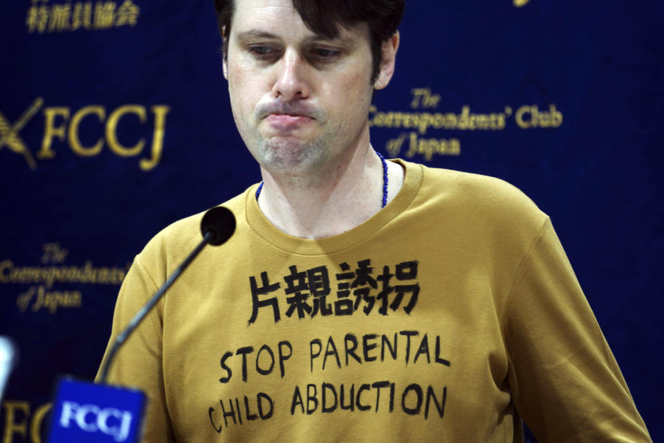 Tokyo-based Australian journalist Scott McIntyre speaks during a press conference at Foreign Correspondent's Club Japan in Tokyo Thursday, Jan. 16, 2020. McIntyre said he is a victim of “inhumane" custody laws that allow only one side of the parents access to children of broken marriages, the day after he was convicted of trespassing at the apartment building of his estranged wife's in-laws for trying to find his children. (AP Photo/Eugene Hoshiko)