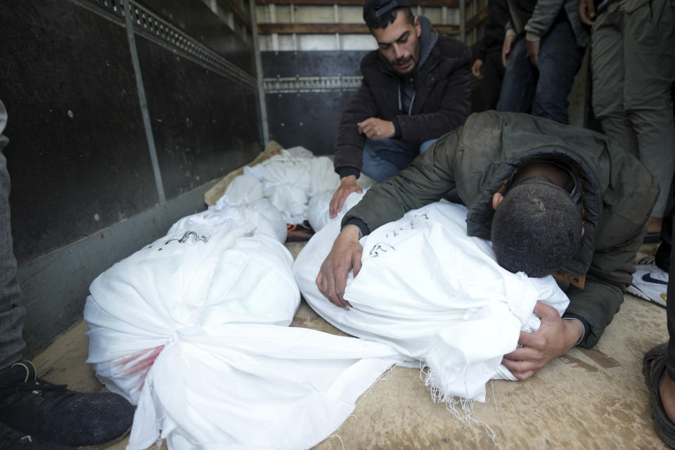 Palestinians mourn their relatives killed in the Israeli bombing of the Nusseirat refugee camp in the Gaza Strip at Al Aqsa Hospital in Deir al Balah on Thursday, Feb. 15, 2024. (AP Photo/Adel Hana)