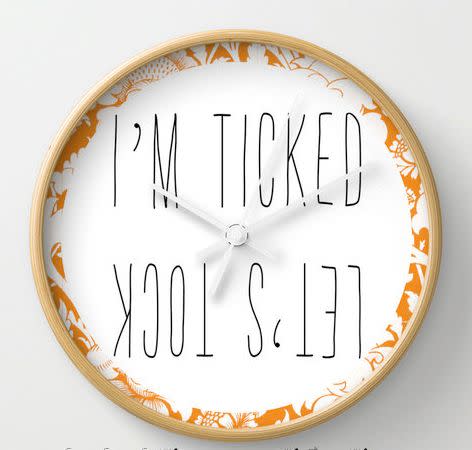 <i>Floral Modern Wall Clock, <a href="https://www.etsy.com/listing/243514157/floral-modern-wall-clock-pun-orange?ga_order=most_relevant&amp;ga_search_type=all&amp;ga_view_type=gallery&amp;ga_search_query=funny%20wall%20clock&amp;ref=sr_gallery_31" target="_blank">$45</a></i>