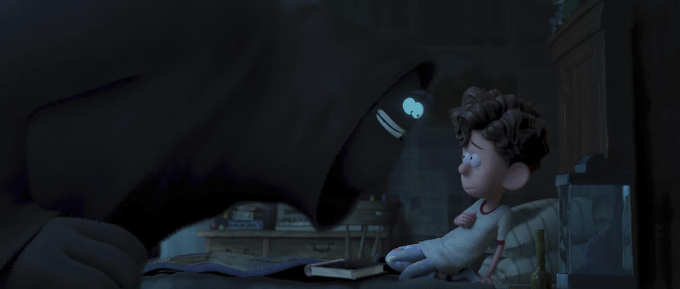 This image released by Netflix shows Orion, voiced by Jacob Tremblay, right, with Dar, voiced by Paul Walter Hauser, in a scene from "Orion and the Dark." (DreamWorks Animation/Netflix via AP)