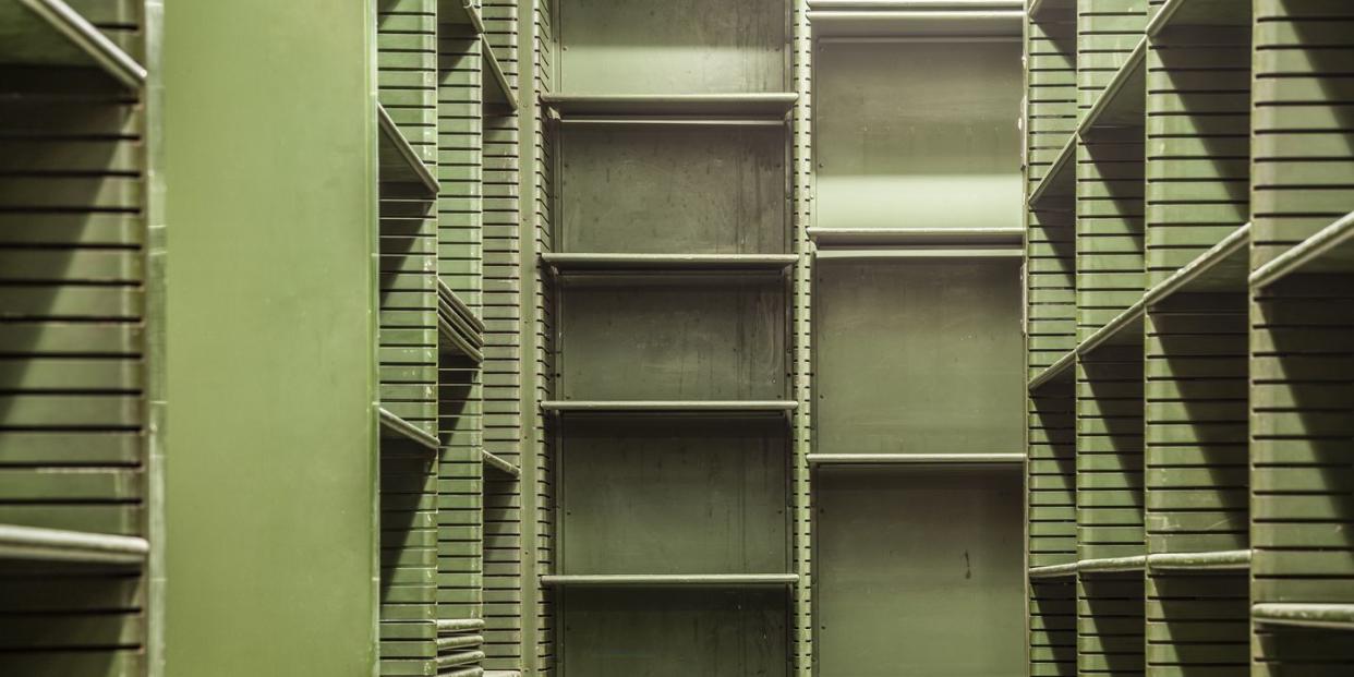 old empty green shelves in a library usa