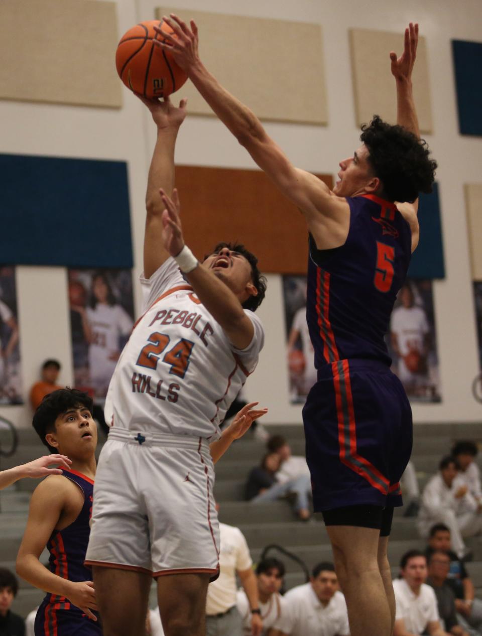 Eastlake's Lucas Brandon stops Pebble Hills' Nicholas Sapien from attempting a shot late in the fourth quarter on Jan. 2, 2023. Eastlake won the match 44-41.