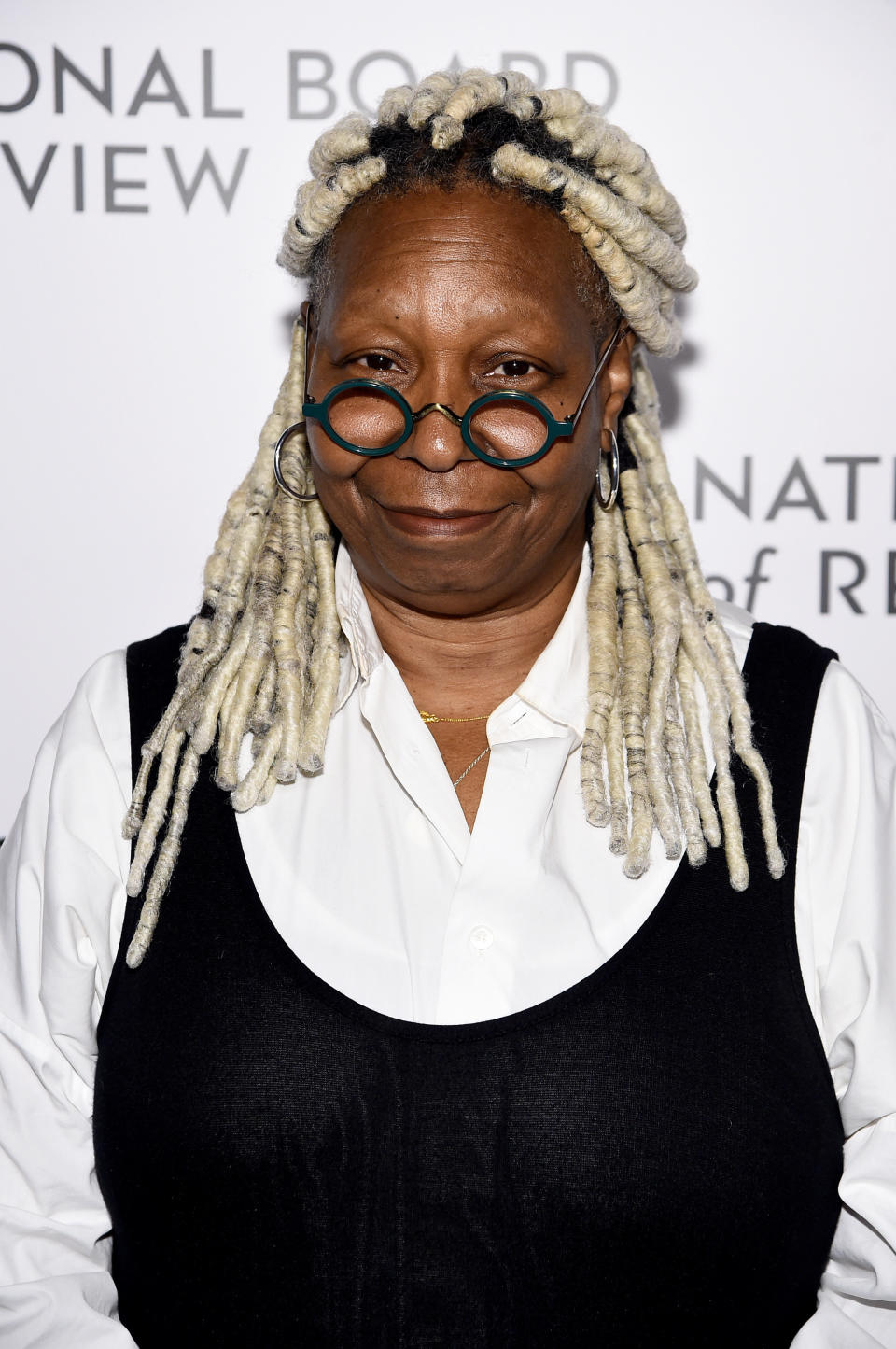 Whoopi Goldberg smiling at a gala event