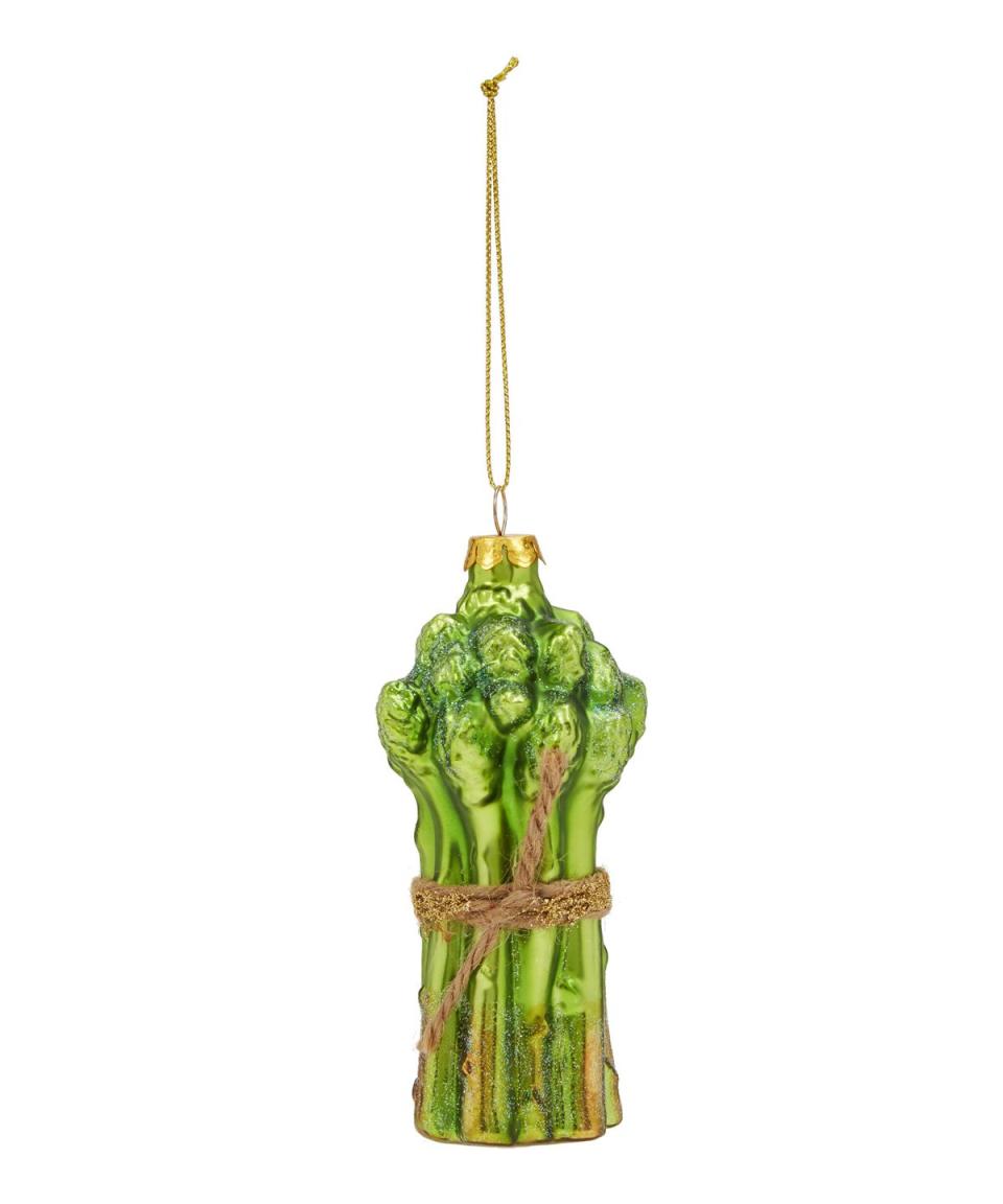 <p><a rel="nofollow noopener" href="https://www.libertylondon.com/uk/asparagus-bauble-R202258006.html" target="_blank" data-ylk="slk:BUY NOW;elm:context_link;itc:0;sec:content-canvas" class="link ">BUY NOW</a></p><p><strong>Asparagus Bauble, £9.95, Liberty London</strong></p>