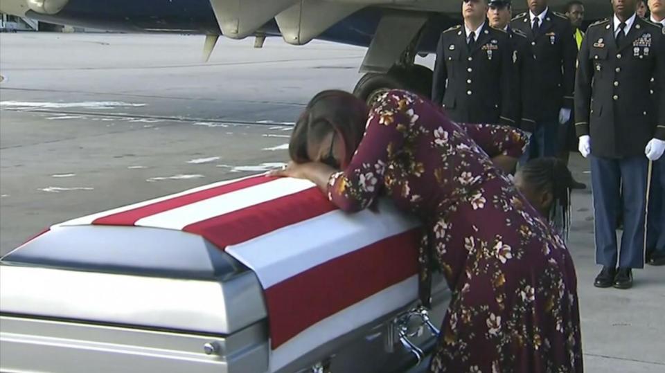 Mr Trump spoke with Myesha Johnson, the widow of Lance Sergeant David Johnson, as she was on the way to meet his casket (AP)