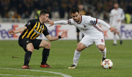 Soccer Football - Europa League - AEK Athens vs AC Milan - OAKA Spiros Louis, Athens, Greece - November 2, 2017 AEK Athens' Konstantinos Galanopoulos in action with AC Milan's Suso REUTERS/Alkis Konstantinidis