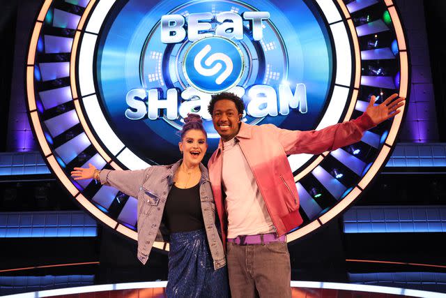 <p>Lorraine O'Sullivan/FOX</p> Kelly Osbourne and Nick Cannon on 'Beat Shazam' season 6