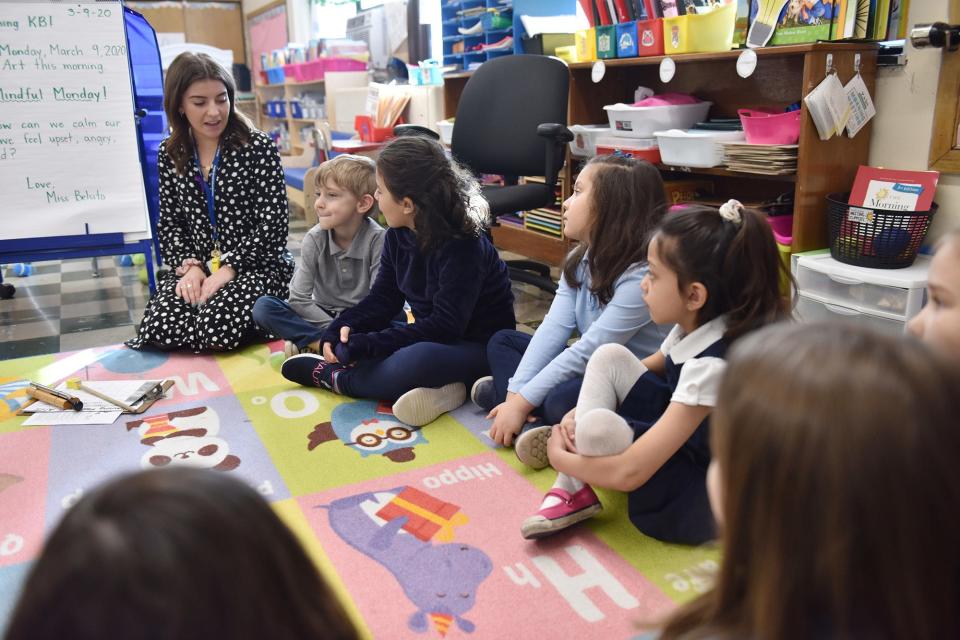 Julianne Belsito, a kindergarten teacher, leads her class in a morning meeting at Helen I. Smith Elementary School, which uses mindfulness programs in their curriculum in Saddle Brook, N.J.