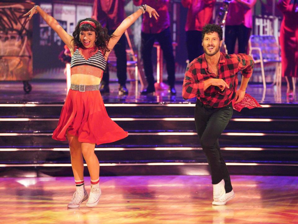 Xochitl Gomez and Val Chmerkovskiy dancing salsa.