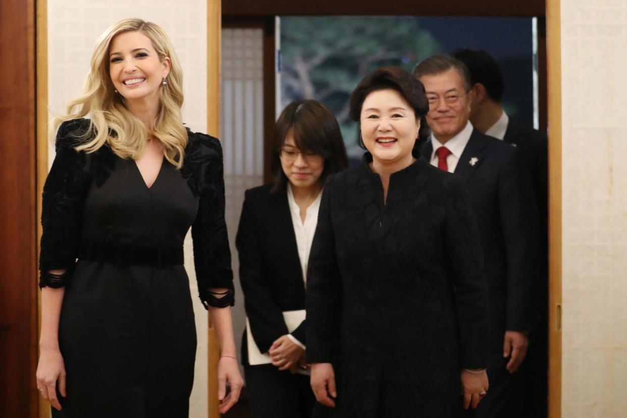 South Korean President Moon Jae-in, right, and first lady Kim Jung-sook with Ivanka Trump walking in for dinner at the president's office Cheong Wa Dae in Seoul: EPA