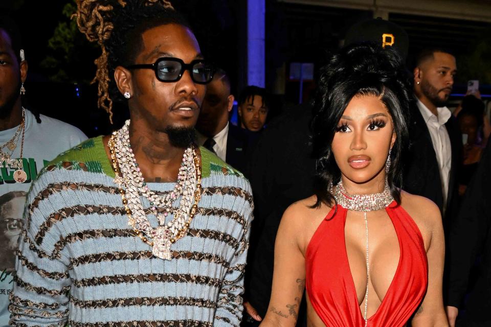 <p>Jason Koerner/Getty Images for E11EVEN</p> Offset and Cardi B in December 2022