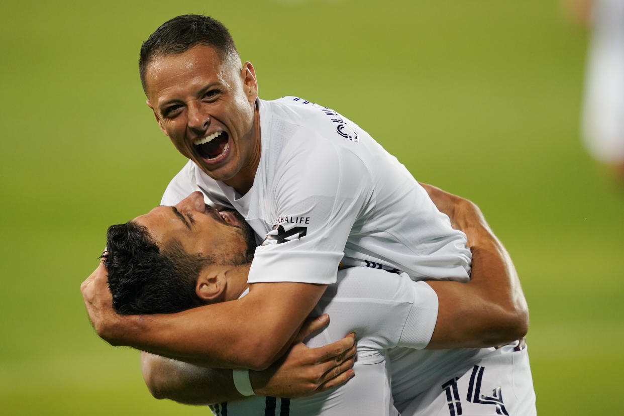 SAN JOSE, CA - OCTOBER 03: Sebastian Lletget #17 of the Los Angeles Galaxy celebrates scoring with Javier Hernandez #14 during a game between Los Angeles Galaxy and San Jose Earthquakes at Earthquakes Stadium on October 03, 2020 in San Jose, California.(Photo by John Todd/ISI Photos/Getty Images).