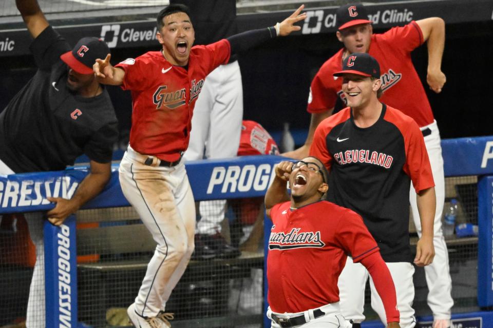 The Cleveland Guardians celebrate a walk-off win over the Minnesota Twins, Wednesday, June 29, 2022, in Cleveland.