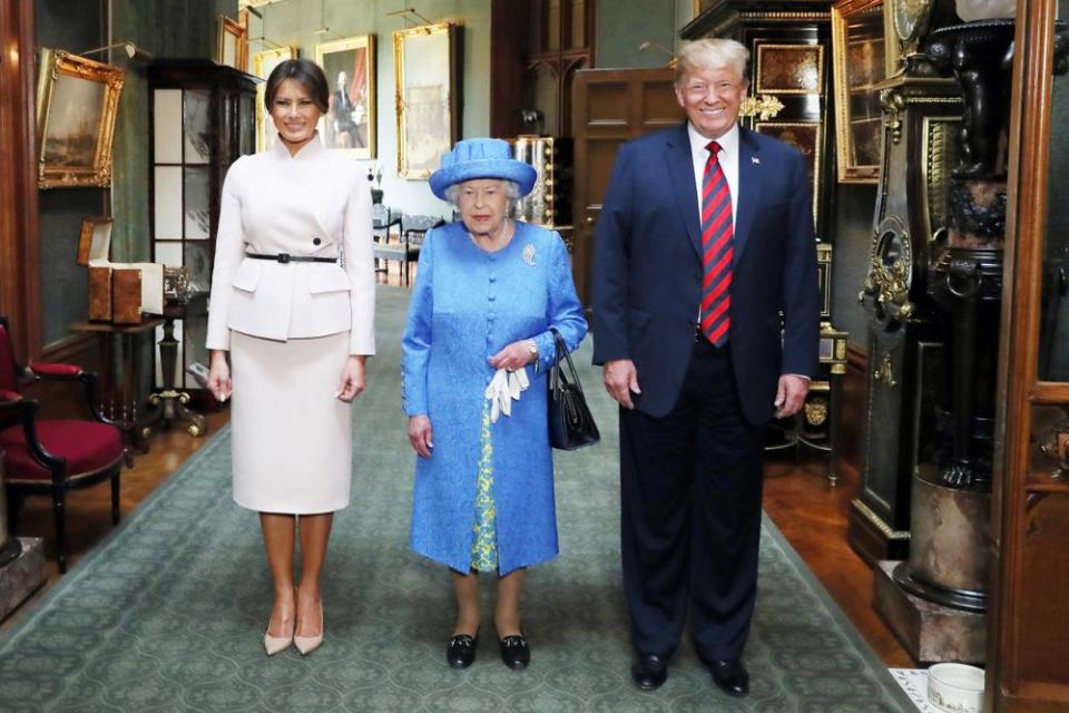 First Lady Melania Trump with Queen Elizabeth II and President Donald Trump