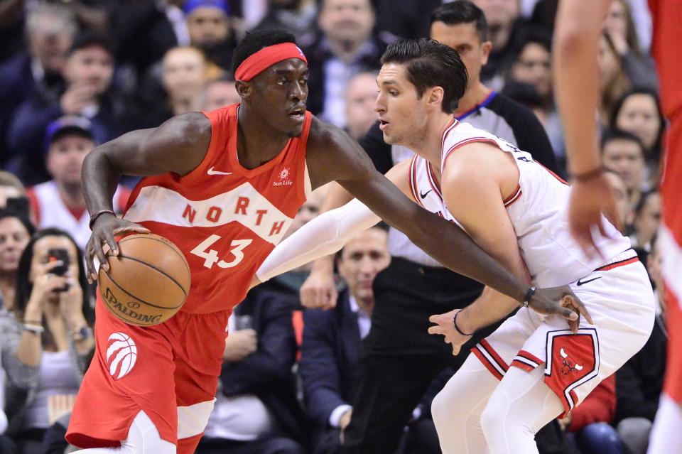 Toronto Raptors forward Pascal Siakam (43) moves forward as Chicago Bulls guard Ryan Arcidiacono (51) defends during the first half of an NBA basketball game in Toronto on Tuesday, March 26, 2019. (Frank Gunn/The Canadian Press via AP)