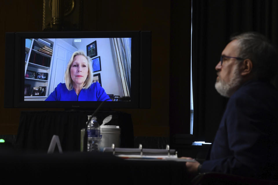 Sen. Kirsten Gillibrand, D-N.Y., speaks virtually during a Senate Environment and Public Works Committee oversight hearing to examine the Environmental Protection Agency, Wednesday, May 20, 2020 on Capitol Hill in Washington, with Andrew Wheeler, administrator of the Environmental Protection Agency, left. (Kevin Dietsch/Pool via AP)
