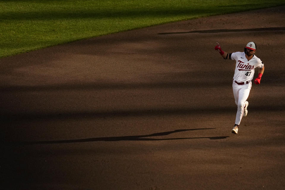 Minnesota Twins' Edouard Julien runs the bases after hitting a solo home run against the Kansas City Royals during the first inning of a baseball game Wednesday, July 5, 2023, in Minneapolis. (AP Photo/Abbie Parr)