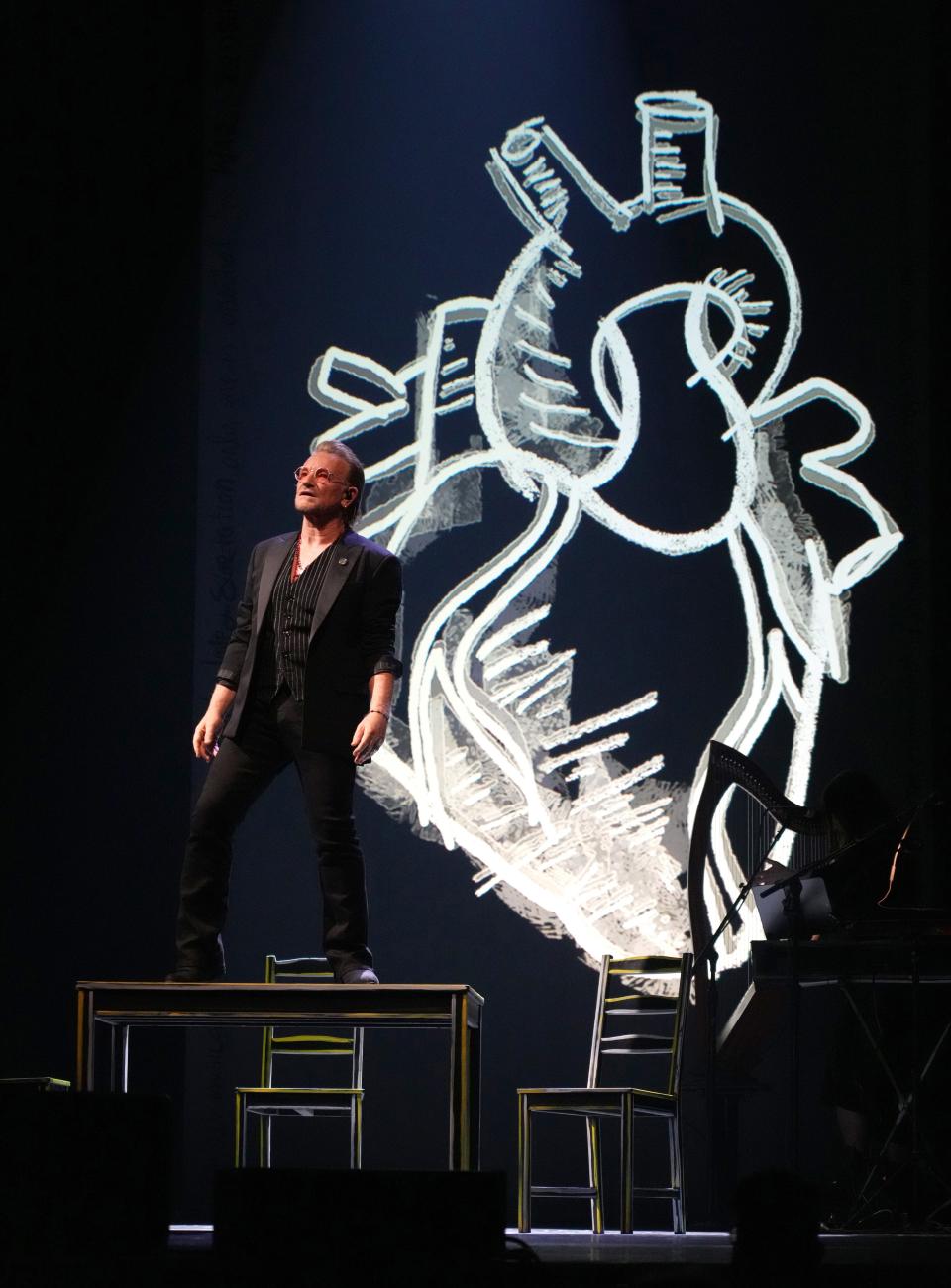 Bono shares the story of his heart surgery during his performance at the Beacon Theatre in New York on April 16, 2023.