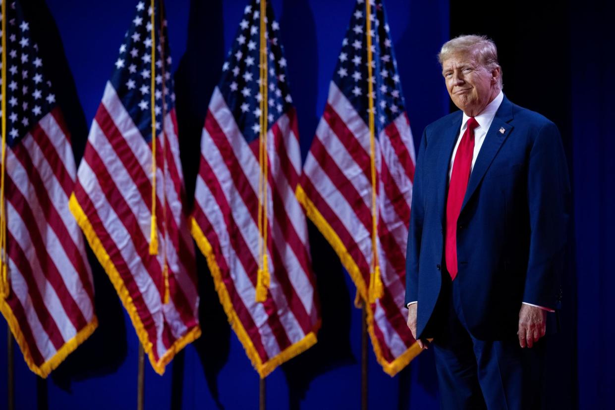 <span>Donald Trump speaks in Washington DC on 22 June 2024.</span><span>Photograph: Nathan Posner/REX/Shutterstock</span>