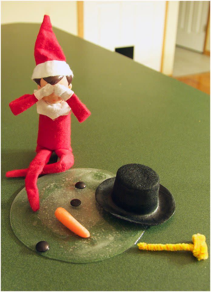Elf on the Shelf Mourning a Melting Snowman