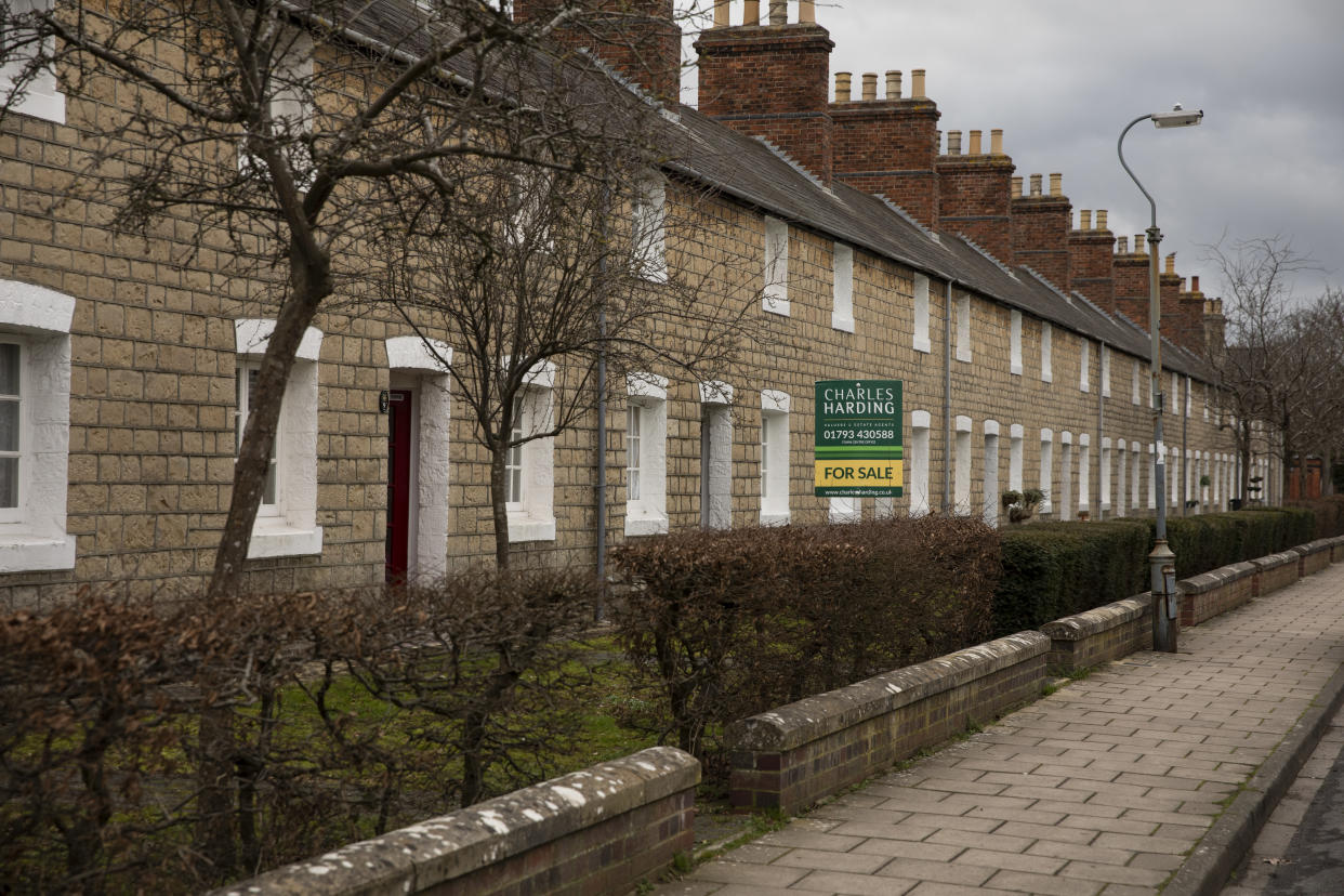 SWINDON, ENGLAND - FEBRUARY 20: A for sale sign down a street in what is known as the Railway Village on February 20, 2019 in Swindon, England. The area once housed the workers of the GWR (Great Western Railway) but now comprises of private and social housing. The car manufacturer Honda announced on Tuesday it is to shut down the Swindon plant in 2022, putting 3,500 jobs at risk. The factory is Honda's only EU plant and has produced the Honda's 'Civic' model for over 24 years, with 150,000 of the cars rolling off the line annually. The manufacturer is a major employer in the town of around 220,000 and sits on the M4 corridor between London to the East and Bristol to the West. In 1986 one of the towns last major employers GWR (Great Western Railway) closed it's doors after a 140 year history of Railway locomotive manufacture putting around 1,500 people out of work. (Photo by Dan Kitwood/Getty Images)