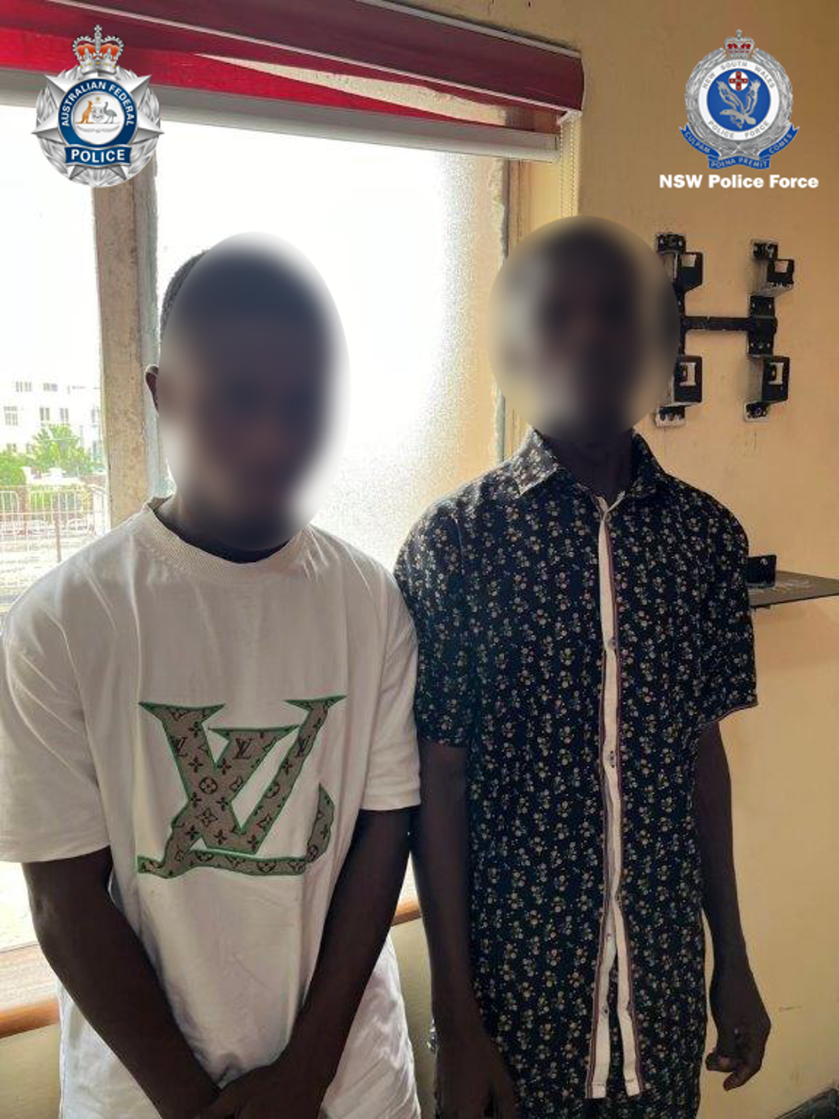 Two men have been arrested and charged in Nigeria over an alleged sextortion case (NSW Police)