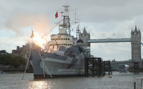 The six inch guns on board HMS Belfast in London are fired to mark the 75th anniversary of the D-Day landings - Credit: Yui Mok/PA