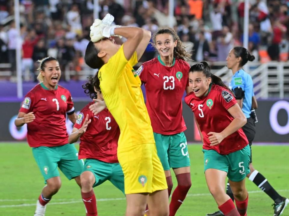 Morocco's players celebrate their upset of Nigeria in the semifinals of the Women's Africa Cup of Nations this month. (AFP via Getty Images - image credit)