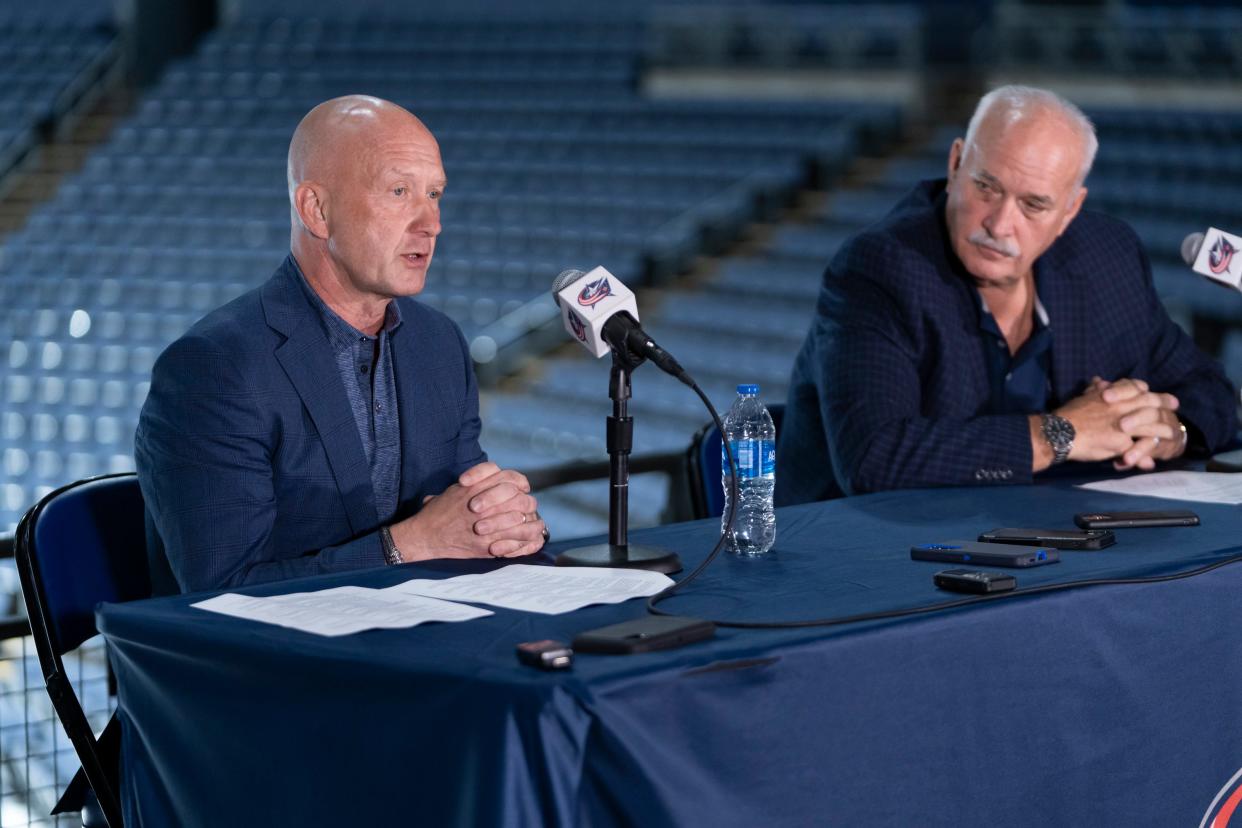 Jarmo Kekalainen (left), here with team president John Davidson, is in his 12th season as Blue Jackets GM. His teams have a record of 410-361-97.