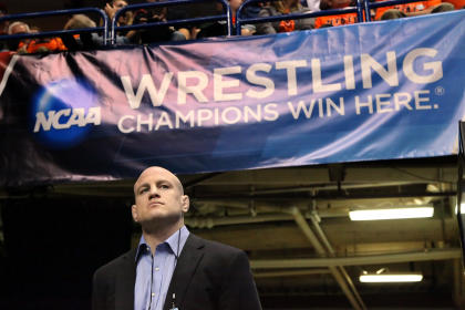 Penn State coach Cael Sanderson looks on during the NCAA Wrestling Championships. (Getty)