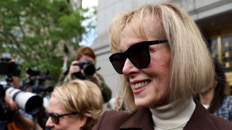 PHOTO: E. Jean Carroll reacts as she exits the Manhattan Federal Court following the verdict in the civil rape accusation case against former U.S. President Donald Trump, in New York City, May 9, 2023. (Brendan Mcdermid/Reuters, FILE)