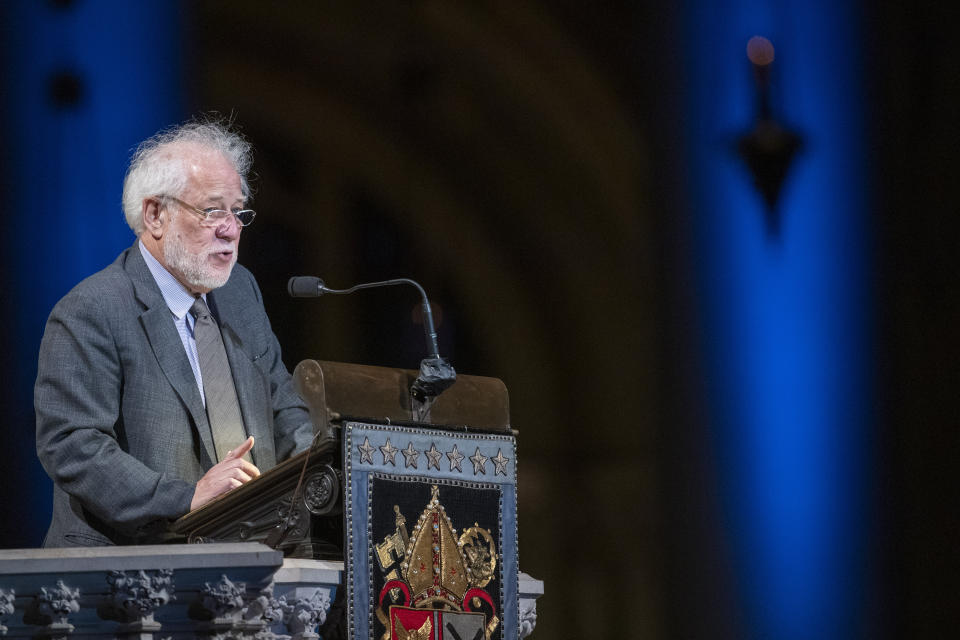 Poet Michael Ondaatje speaks during the Celebration of the Life of Toni Morrison, Thursday, Nov. 21, 2019, at the Cathedral of St. John the Divine in New York. Morrison, a Nobel laureate, died in August at 88. (AP Photo/Mary Altaffer)