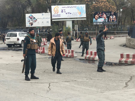 Afghan policemen keep watch at the site of a blast in Kabul, Afghanistan November 12, 2018. REUTERS/Omar Sobhani