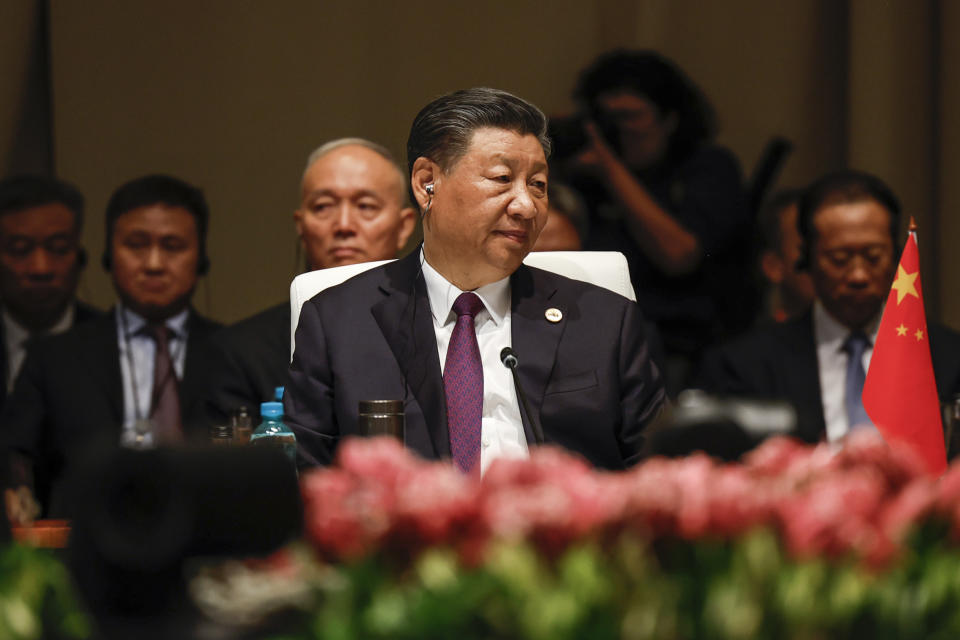 China's President Xi Jinping looks on at the plenary session during the 2023 BRICS Summit in Johannesburg, South Africa, Wednesday, Aug. 23, 2023. (Gianluigi Guercia/Pool via AP)