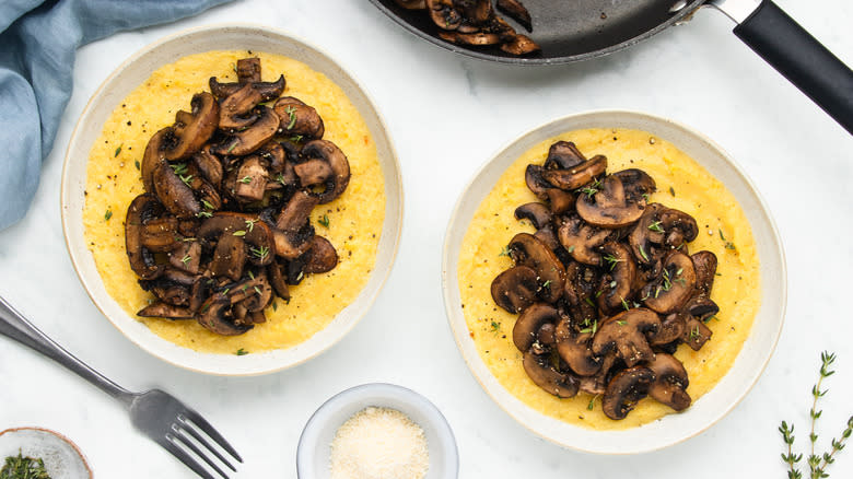Two bowls of mushroom polenta with thyme