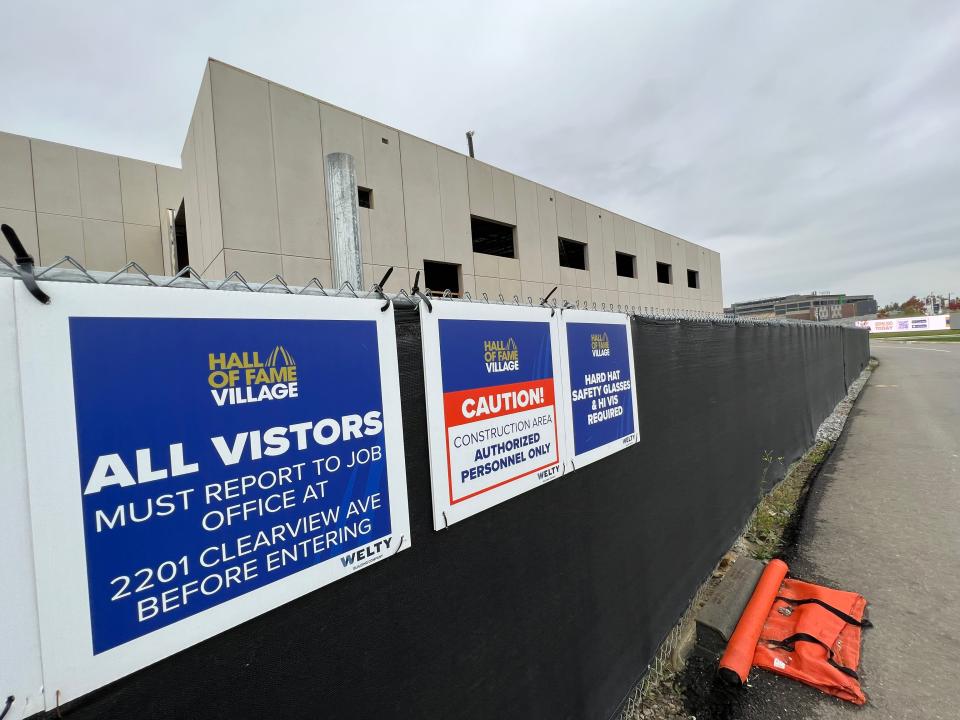 Work continues on a football-themed water park at the Hall of Fame Village in Canton. The company said Thursday that the water park won't open until at least early next year.