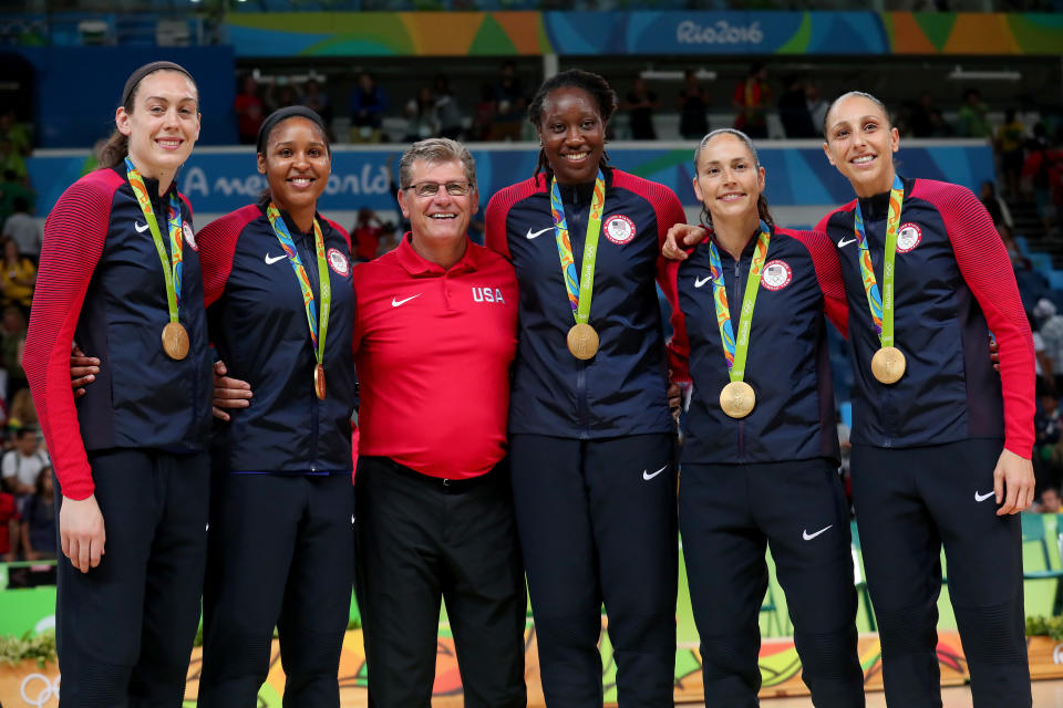 Breanna Stewart, Maya Moore, head coach Geno Auriemma, Tina Charles, Sue Bird and Diana Taurasi. 