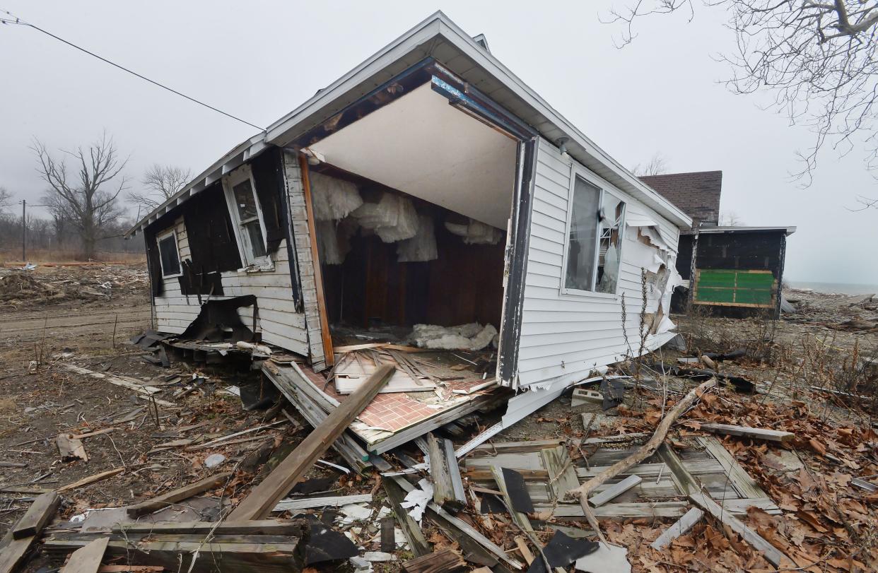 One of the former Dohler cottages is shown on property now being developed as Edgewater, with home sites overlooking Lake Erie, back right, in North East Township.