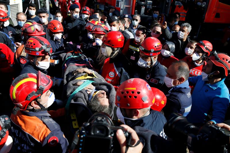 Rescue workers search for earthquake survivors in Izmir