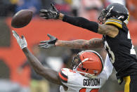 <p>Cleveland Browns wide receiver Josh Gordon (12) can’t hold onto the ball under pressure from Pittsburgh Steelers defensive back Joe Haden (23) during the second half of an NFL football game, Sunday, Sept. 9, 2018, in Cleveland. (AP Photo/David Richard) </p>