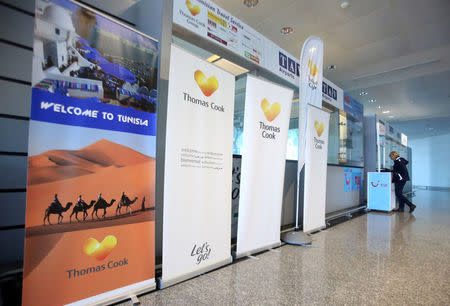 Banners for Thomas Cook travel agency are seen at the Enfidha Airport in Enfidha, Tunisia February 13, 2018. REUTERS/Amine Ben Aziza