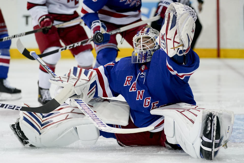 New York Rangers goaltender Igor Shesterkin (31) makes a save in the first period of Game 4 of an NHL hockey Stanley Cup second-round playoff series, Tuesday, May 24, 2022, in New York. (AP Photo/John Minchillo)