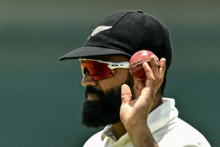 New Zealand's Ajaz Patel gestures after taking a five-wicket haul (IDREES MOHAMMED)